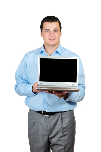 Affärsman som innehar en laptop isolerad på vit — Stockfoto