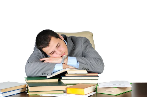 Business man sleeping on book heaps isolated on white background — Stock Photo, Image