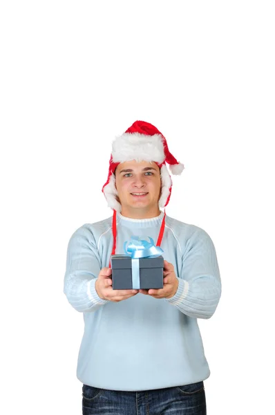 Jovem no chapéu do Papai Noel segurando caixa de presente isolada no fundo branco — Fotografia de Stock