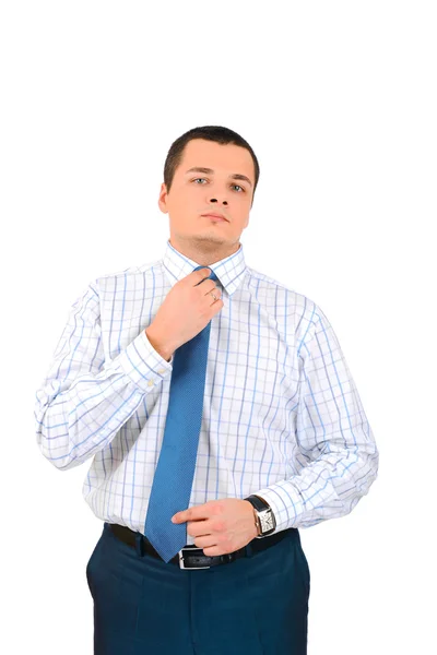 Retrato de un hombre de negocios tocándose la corbata, aislado sobre fondo blanco — Foto de Stock