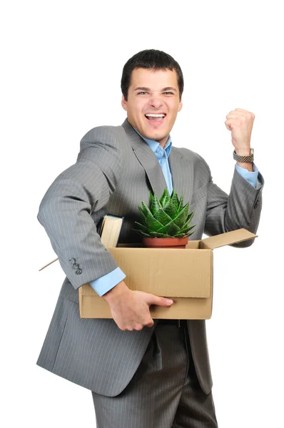 You are fired! Young businessman hold cardboardbox with personal belongings isolated on white background — Stock Photo, Image