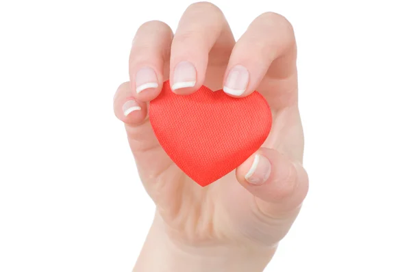 Herz in weiblicher Hand — Stockfoto