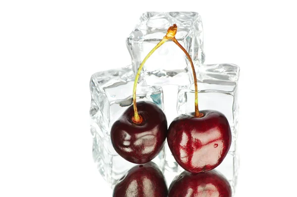 Cherry and ice cubes isolated on white background — Stock Photo, Image