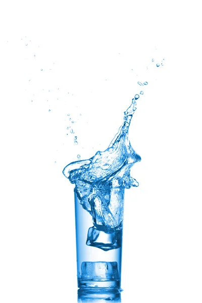 Water splashes in the glass on white background — Stock Photo, Image