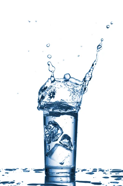 Water splashes in the glass on white background — Stock Photo, Image