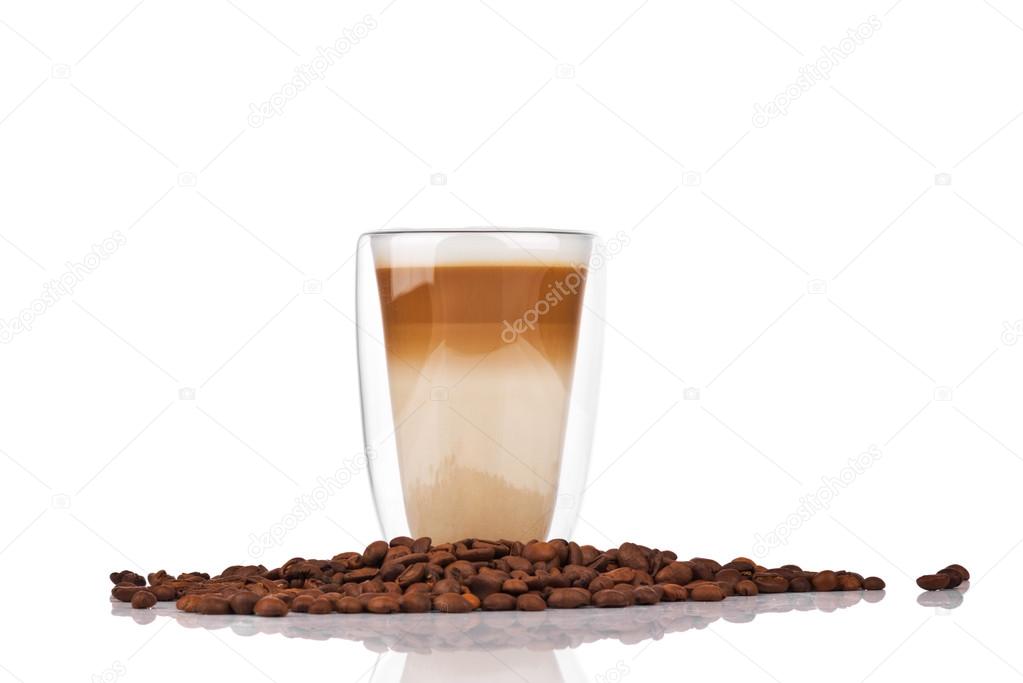 Cup of coffee latte with coffee beans