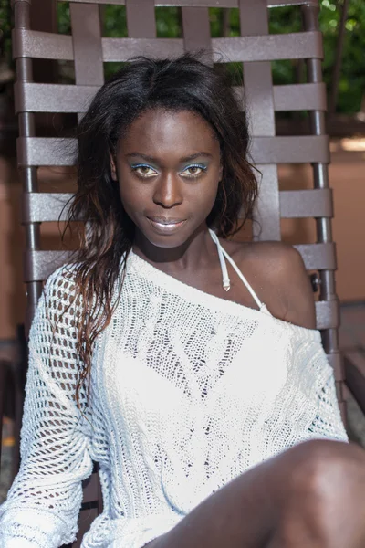 Young woman wearing white net sweater — Stock Photo, Image