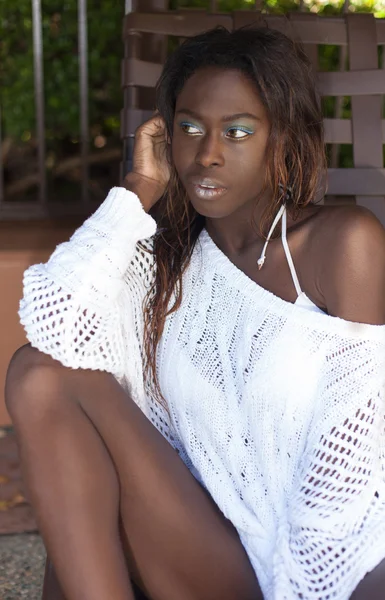 Young woman wearing white net sweater — Stock Photo, Image