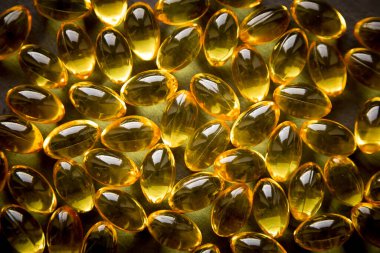 Omega 3 kapsüllerinin arka plan dokusu, balık yağı, sağlık, koyu