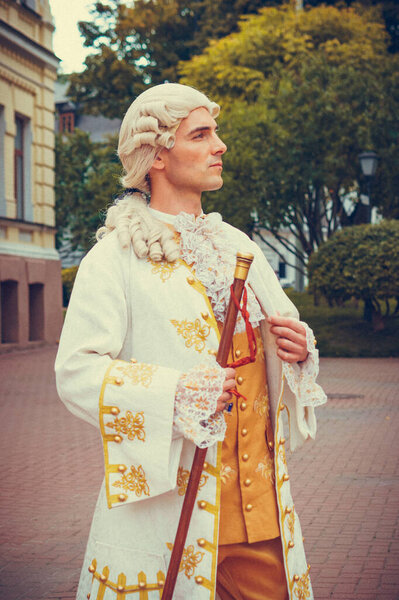 Portrait of a man in a medieval costume. Retro style and historical clothes concepts. Ukrainian Men's fashion of the 18th century
