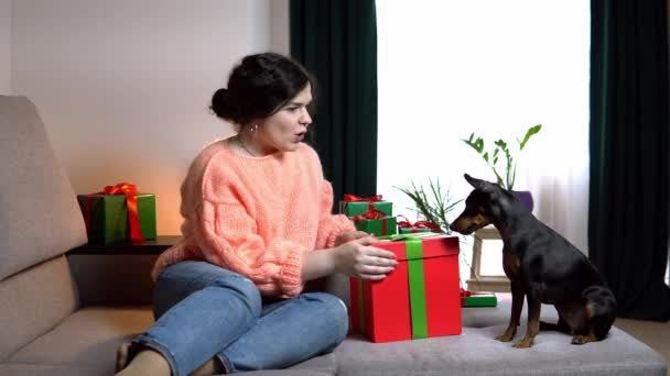 Happy Young Woman Giving Bon Her Dog Gift Box Concept — Stockvideo