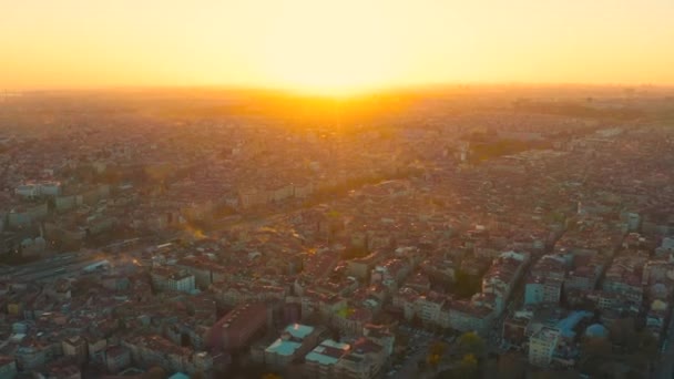 Sunset over the rooftops and slums of old Istanbul. Aerial view 4K — Stock Video