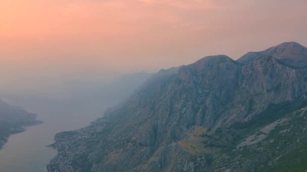 Sunset with fog view of Kotor bay and mountains in Montenegro. — 图库视频影像