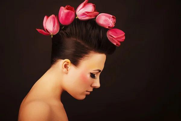 The girl with tulips — Stock Photo, Image