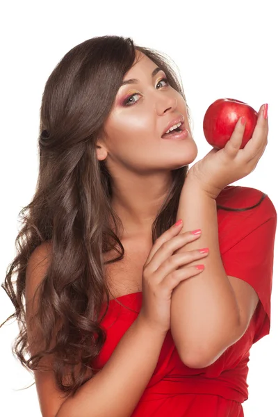 Portrait of girl with red apple in red dress, over white backgro — Stock Photo, Image
