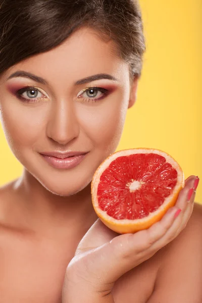 Portrait of sensual young woman with bright makeup holding delic — Stock Photo, Image