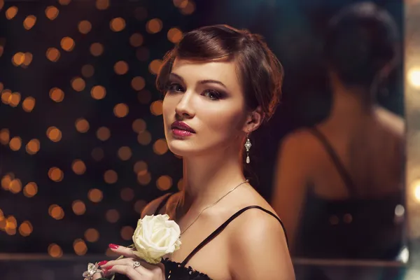 Retro woman holding white rose — Stock Photo, Image