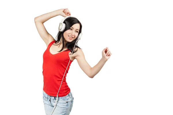 Menina cantando e dançando com fones de ouvido — Fotografia de Stock