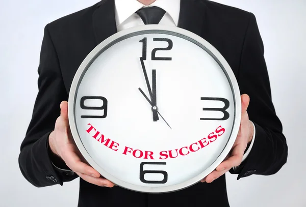 Man holding clock — Stock Photo, Image