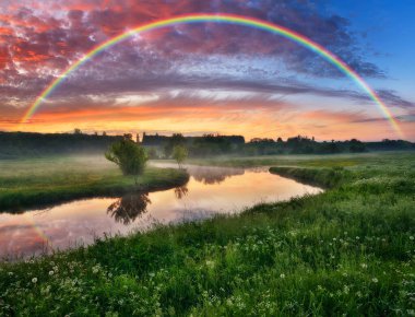 Landscape with a Rainbow on the River in Spring. colorful morning. nature of Ukraine