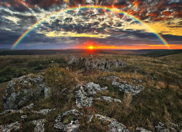 Rainbow with clouds over the canyon. autumn landscape. nature of Ukraine