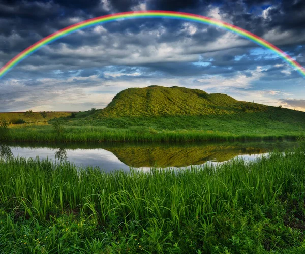 stock image Landscape with a Rainbow on the River in Spring. colorful morning. nature of Ukraine