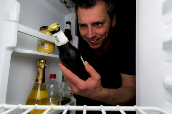 Man longing for beer in the middle of the night — Stock Photo, Image