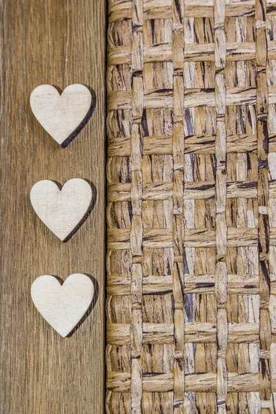 Three hearts on wood — Stock Photo, Image