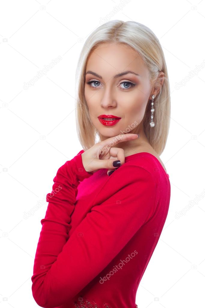 portrait of a beautiful young woman in a red dress