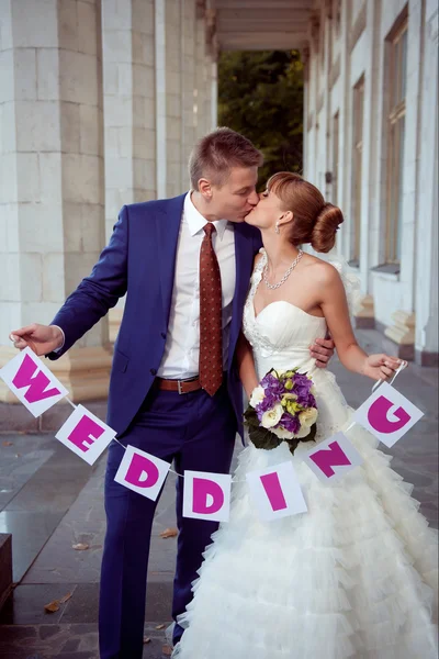 Beautiful couple in wedding costumes