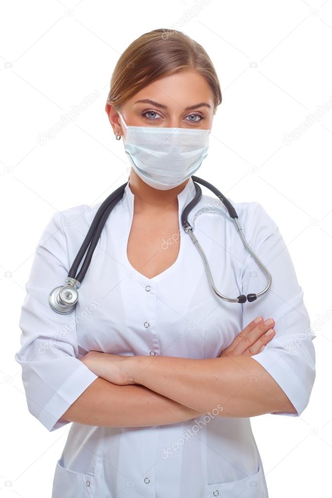 Doctor smiling behind surgeon mask