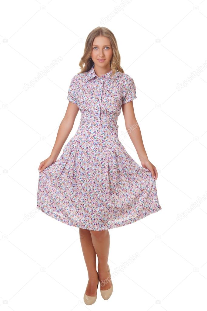A beautiful young woman in summer dress