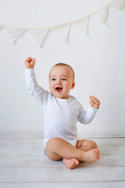 Chubby Kid Bodysuit Barefoot Smiles Sits Isolated White Background Studio Royalty Free Stock Images