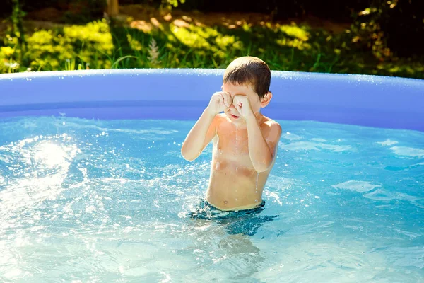 Boy Swims Inflatable Pool Garden Sunny Summer Day Rubs His — Fotografia de Stock