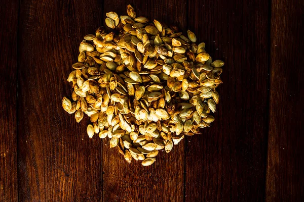 Semillas Calabaza Salada Asada Sobre Mesa Madera — Foto de Stock