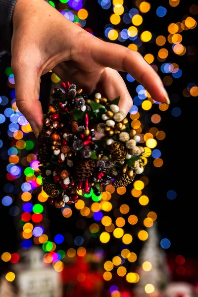 Holding Christmas Decoration Bokeh Lights Background — Stock Photo, Image