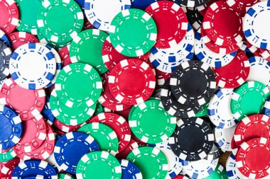 Poker fişleri arka planı. Kumarhane işi, risk, şans, iyi şans veya kumar konsepti