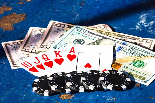 Casino concept for business, risk,chance, good luck or gambling. Playing cards and dollars.