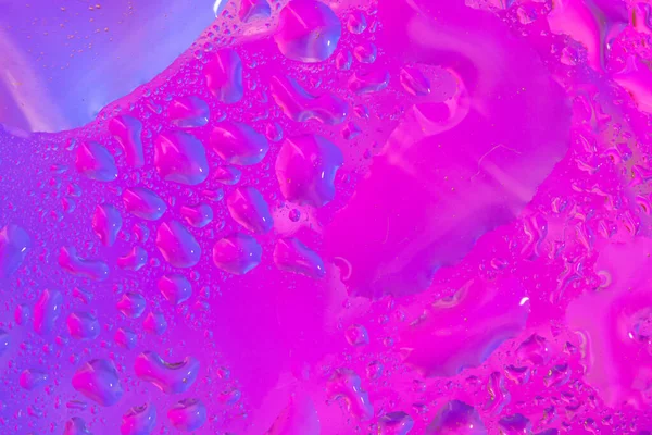 Abstrakter Farbenfroher Hintergrund Oder Hintergrund Mit Wassertropfen Auf Farbenfroher Oberfläche — Stockfoto