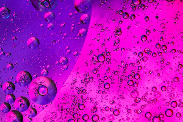 Abstrakte Farbenfrohe Kulisse Mit Öltropfen Und Wellen Auf Der Wasseroberfläche — Stockfoto