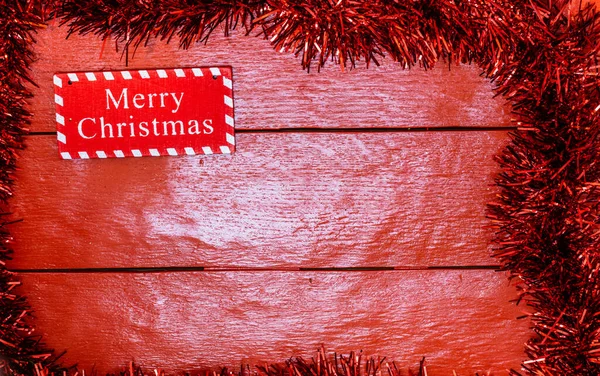 Vánoční Kompozice Červené Dřevěné Desce Vánočními Věnci Dekoracemi Tvůrčí Skladba — Stock fotografie