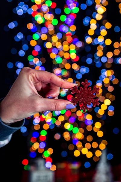 Holding Christmas Snowflake Decoration Isolated Background Blurred Lights December Season — Stock Photo, Image