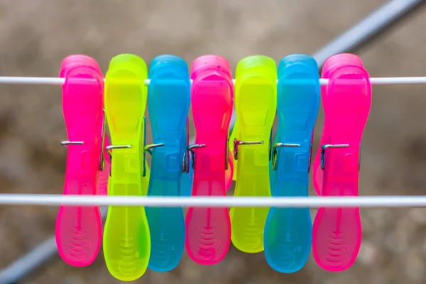 Colorful Plastic Clothes Pegs Empty Metal Clothes Dryer — Stock Photo, Image