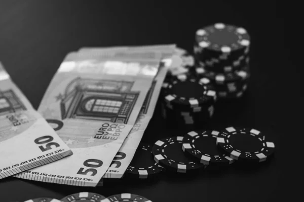 Poker chips, money and gamble