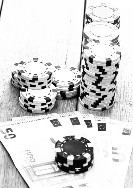 Poker chips, money and gamble