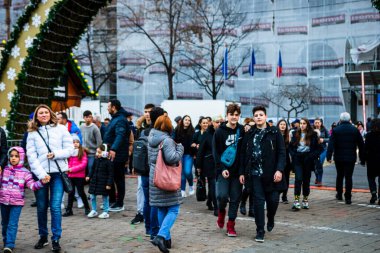 People at Bucharest Christmas Market in downtown Bucharest, Romania, 2022