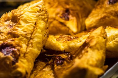 Baked pastry in a bakery window display