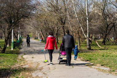 People and tourists wander the streets of the Bucharest Old Town, Romania, 2022