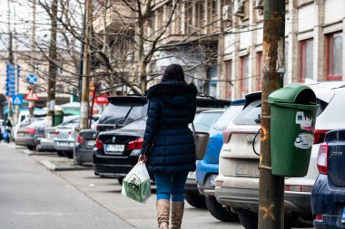 People and tourists wander the streets of the Bucharest Old Town, Romania, 2022
