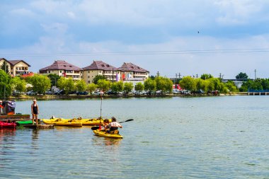 People relaxing at Mogosoaia Palace park near Bucharest, Romania, 2022